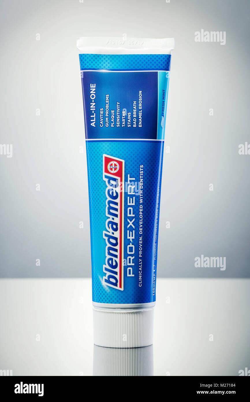 Blend-a-med toothpaste isolated on gradient background. Stock Photo