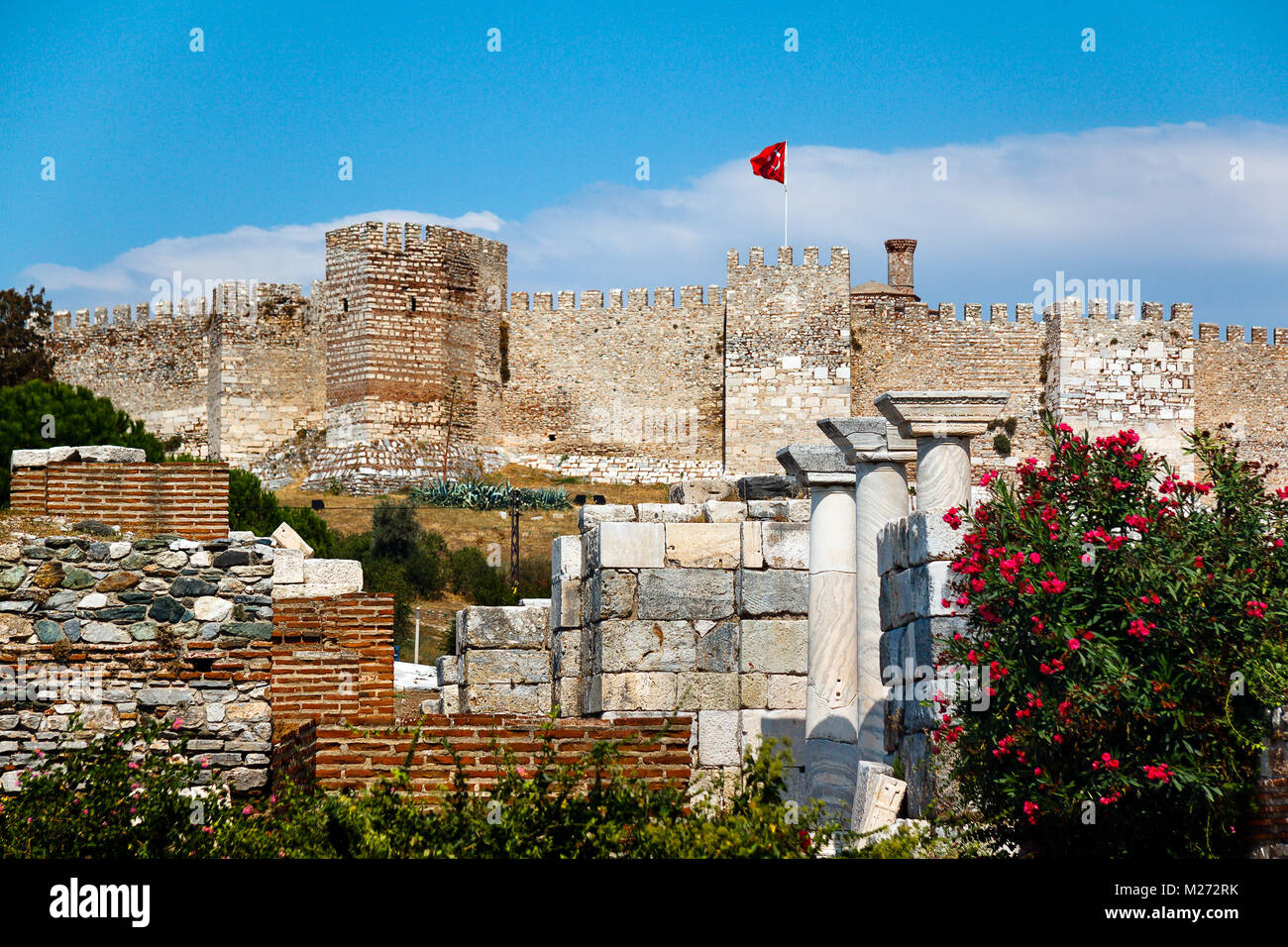 Castle in Selcuk with Turkish flag, Ayasuluk hill. Turkey Stock Photo