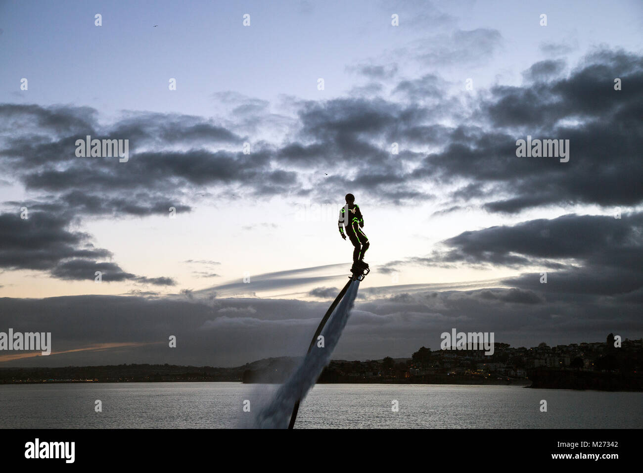 A device attached to the feet that propels a person through the air by