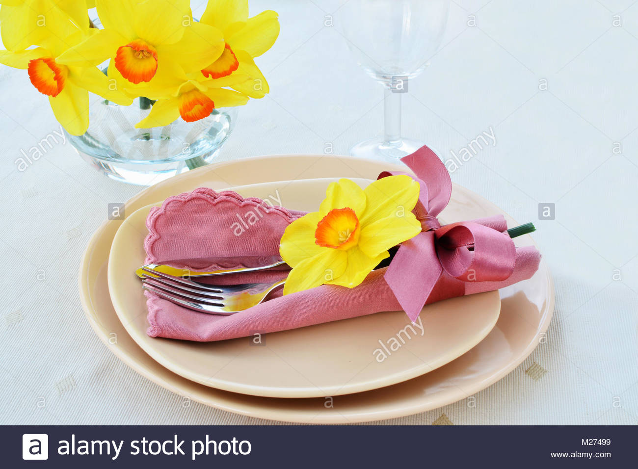 Spring table setting arrangement with cream porcelain dishes, yellow ... Spring table setting arrangement with cream porcelain dishes, yellow ...