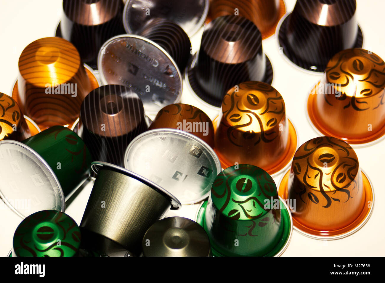 various new 'limited edition' colorful nespresso coffee pods/ capsules on white background Stock Photo