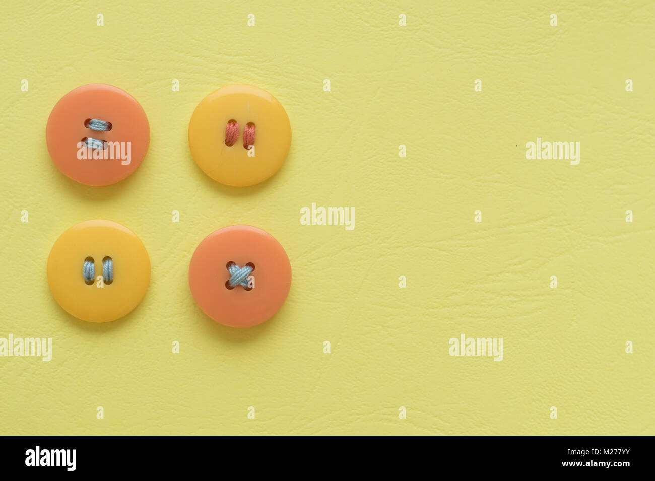 Pastel colors. Yellow and orange buttons on a yellow background Stock ...