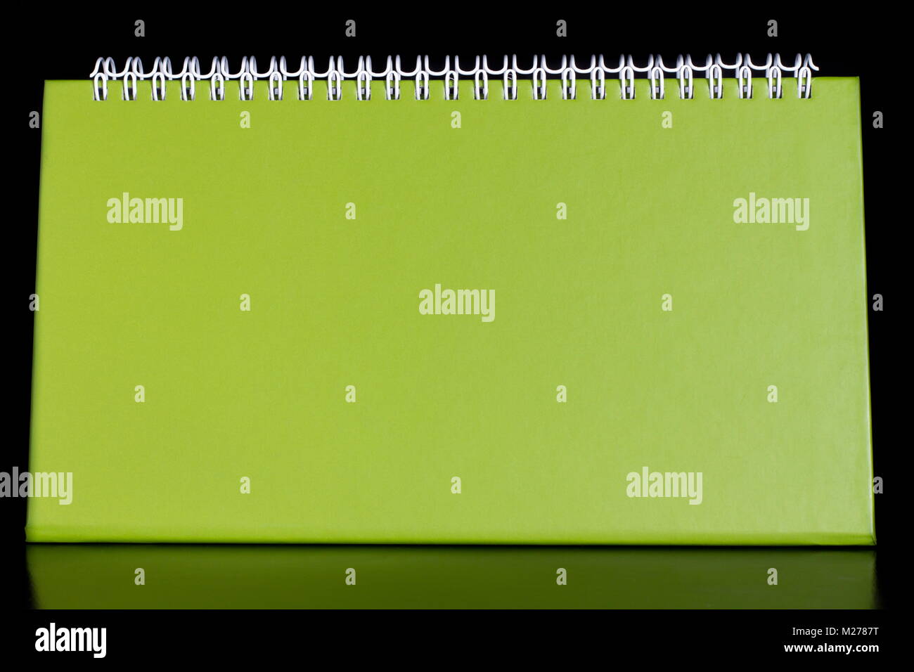 Green blank calendar organizer on black background Stock Photo Alamy
