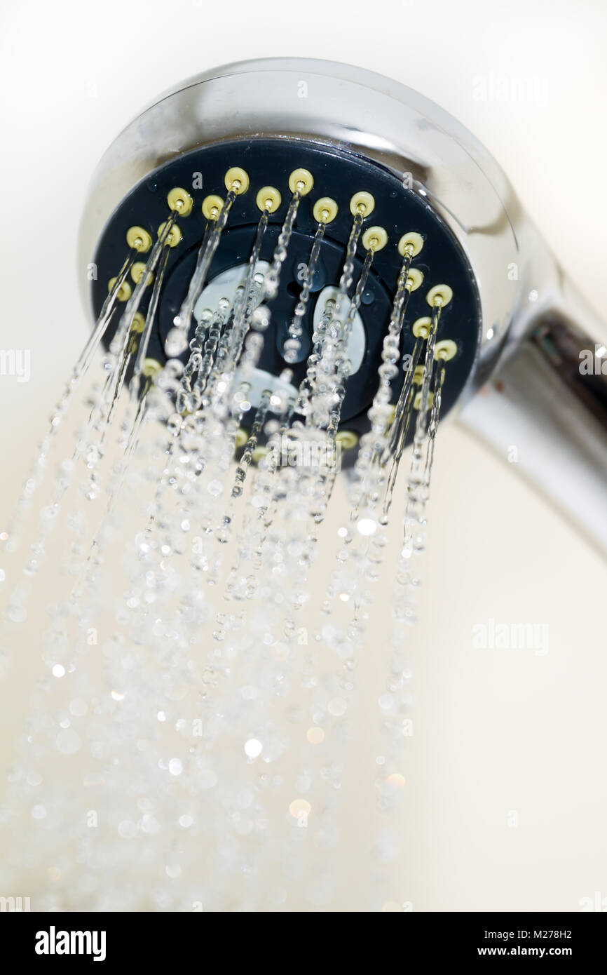 Shower head with frozen water droplets in the bathroom Stock Photo Alamy