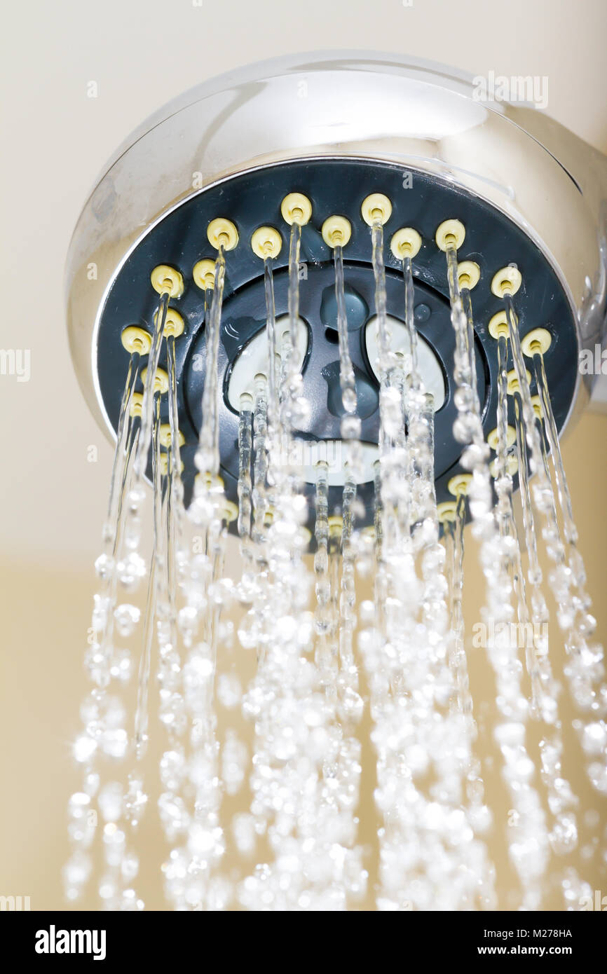 Shower head with frozen water droplets in the bathroom Stock Photo Alamy