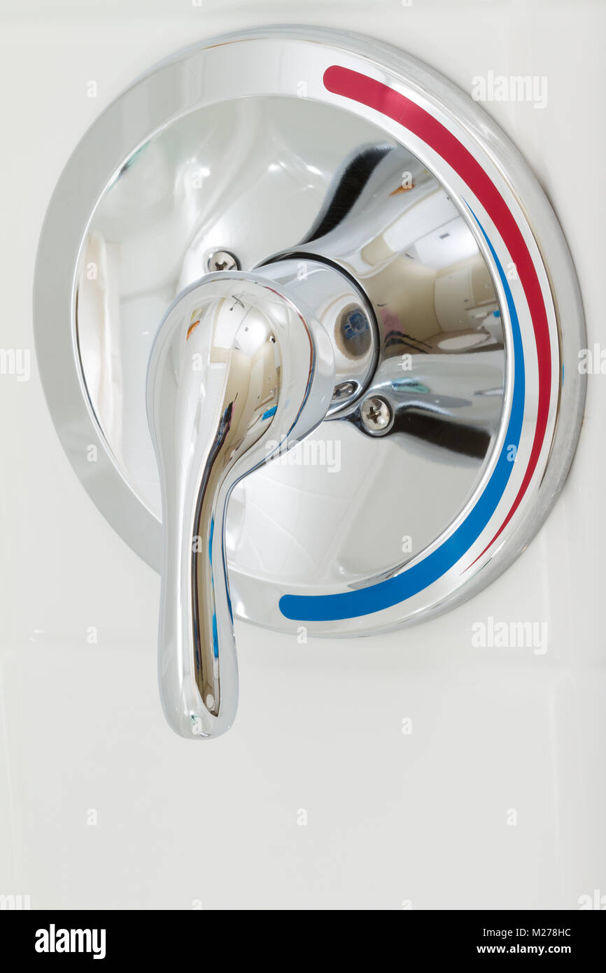 Shower Faucet Cold And Hot Water In The Bathroom Stock Photo