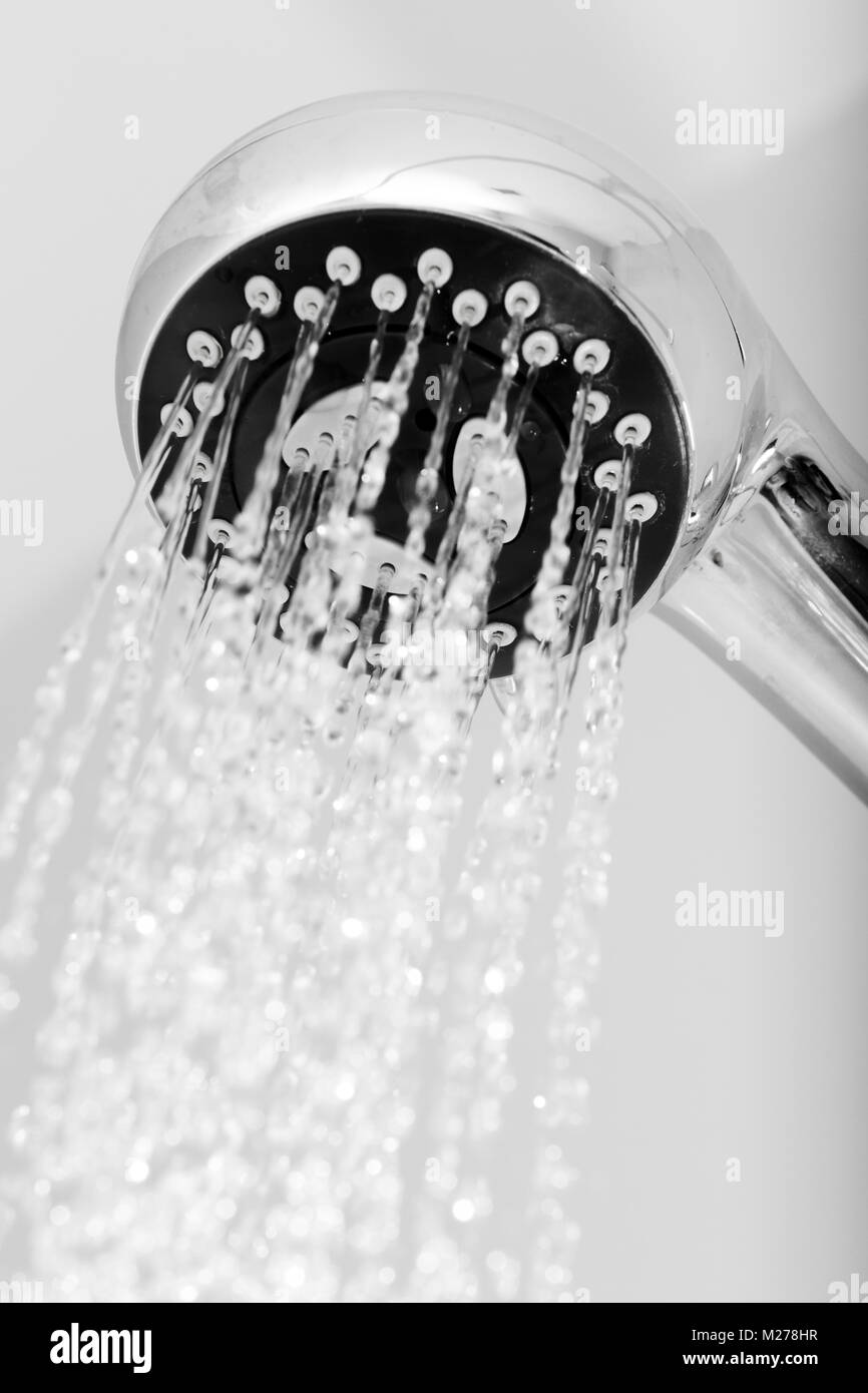 Shower head with frozen water droplets in the bathroom Stock Photo Alamy