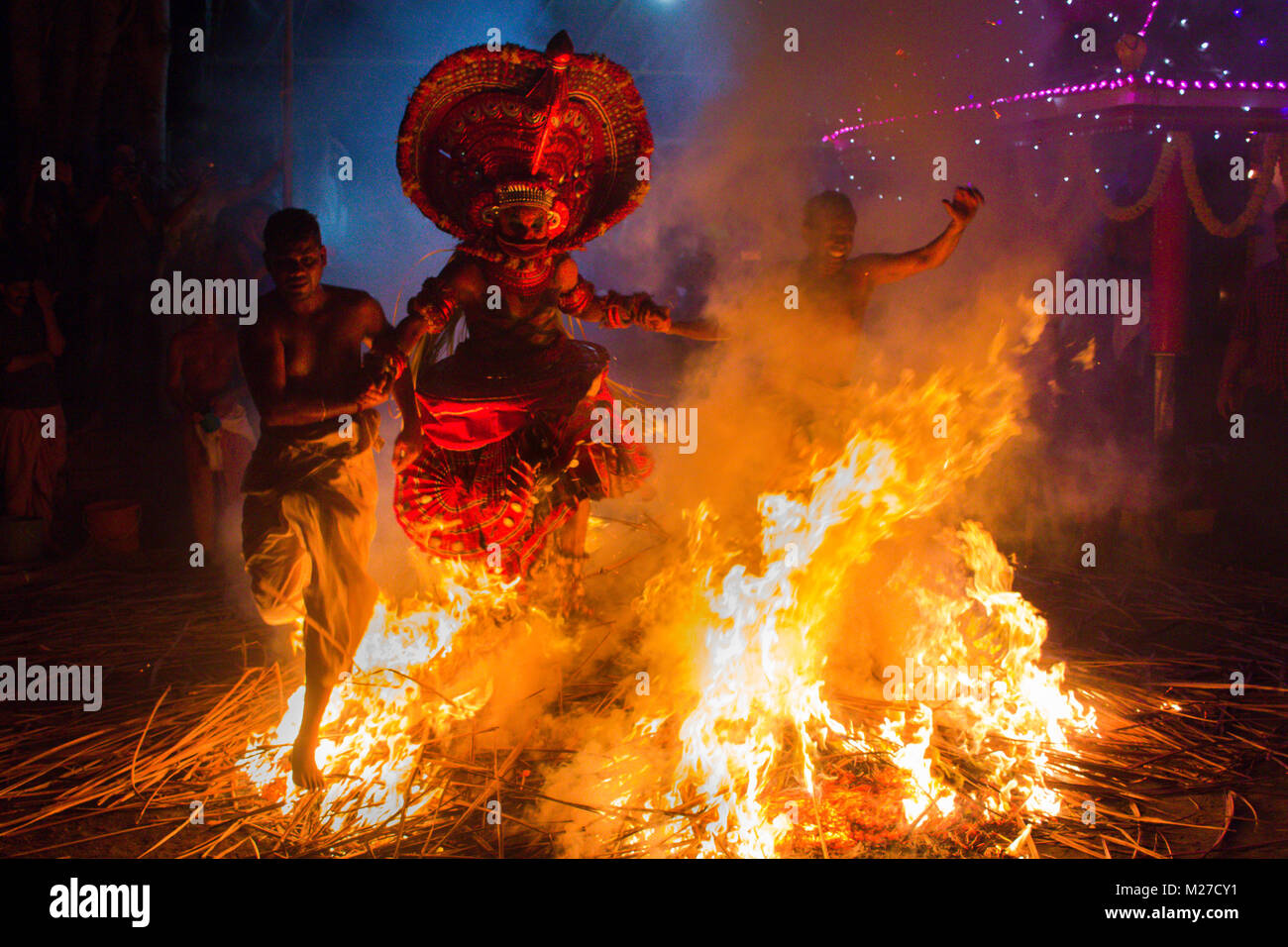 Kandanar Kelan Theyyam enacts the rebirth of Kelan (a yesteryear warrior). Stock Photo