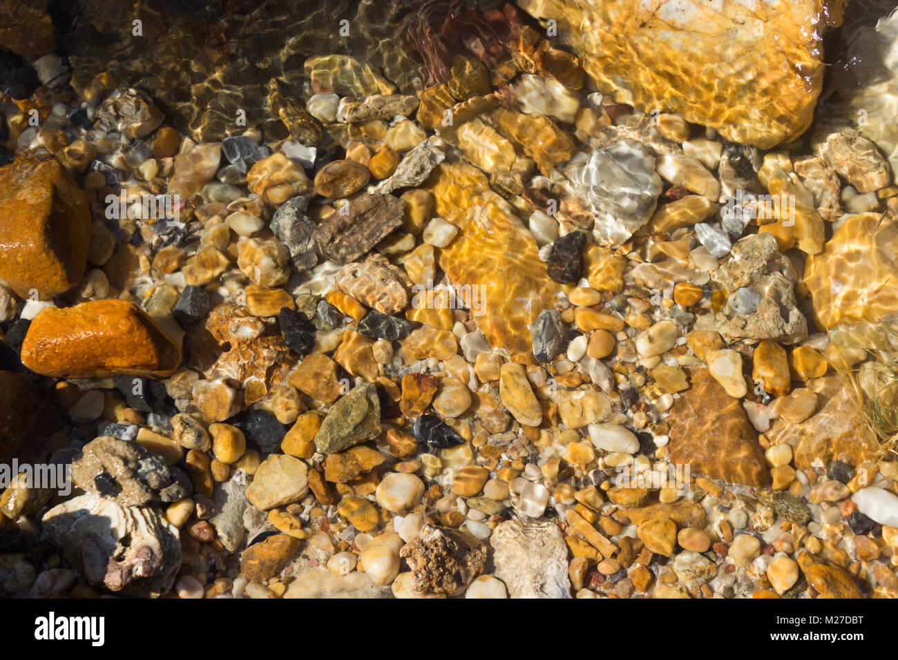 colorful pebbles under water sea for the background Stock Photo