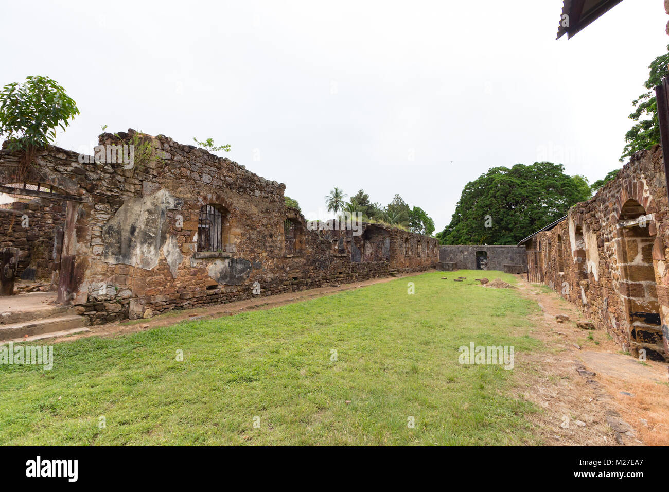 Ruins of former penal colony at Ile Royale, one of the islands of Iles du Salut (Islands of Salvation) in French Guiana. These islands were part of a  Stock Photo