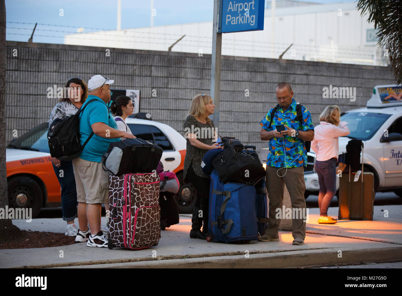 Passengers people waiting for shuttle bus, Fort Lauderdale Hollywood