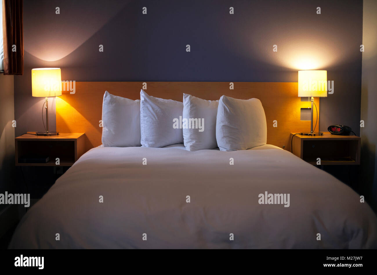 Soft Light And Arranged Pillows Are Very Inviting In A Hotel Room