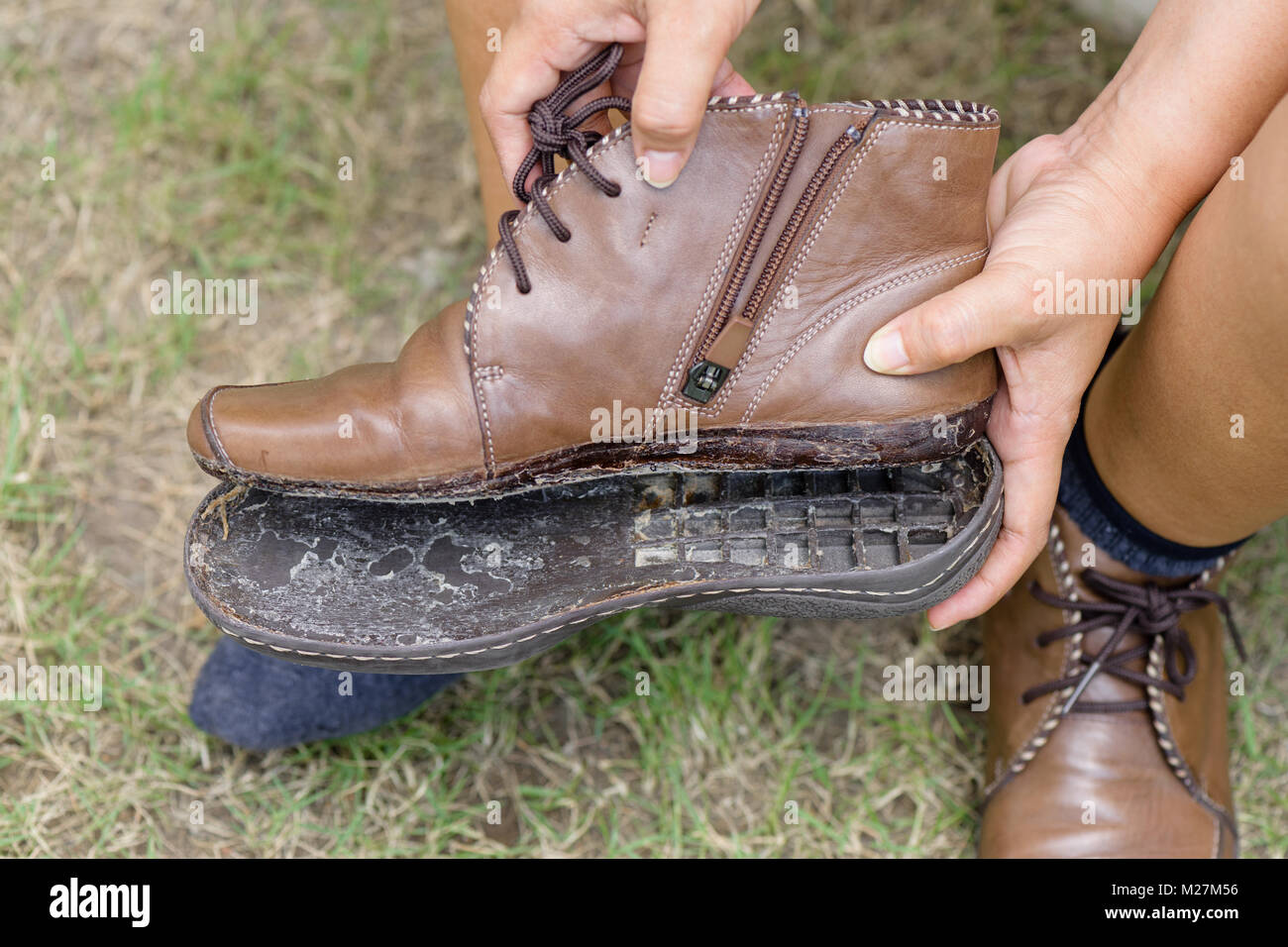 torn women shoe, closeup broken women leather shoe need to repair Stock Photo Alamy