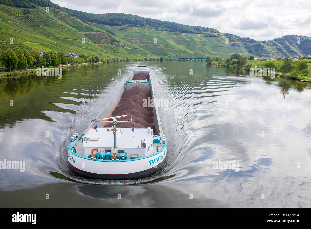 Barge on Moselle river at Piesport, Moselle river, Rhineland-Palatinate, Germany, Europe Stock Photo