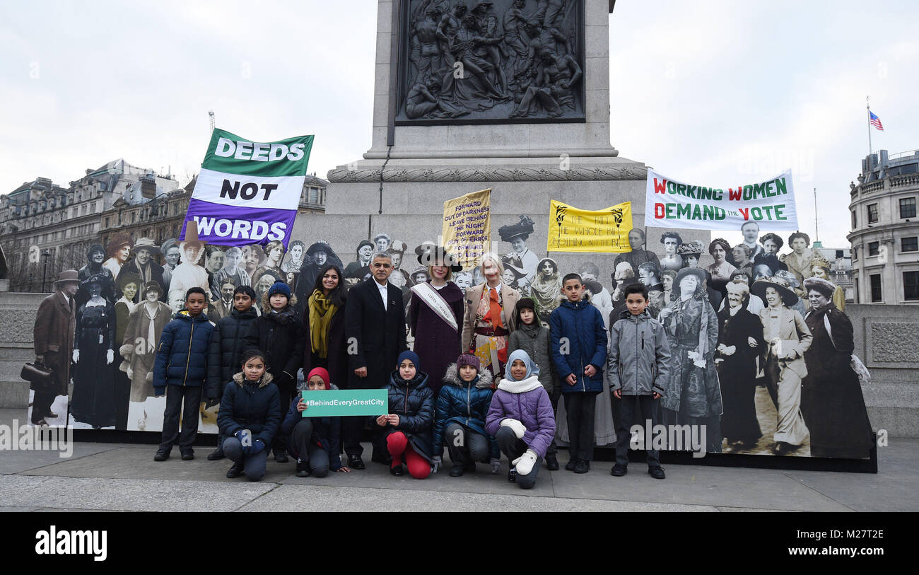 Women's activist Amika George, Mayor of London, Sadiq Khan, Curator of the Historic Royal Palaces Lucy Worsley (second right) and Deputy Mayor Justine Simons (right) with children from Milbank Academy at the opening of an exhibition in Trafalgar Square, London to mark the centenary of women's suffrage. Stock Photo
