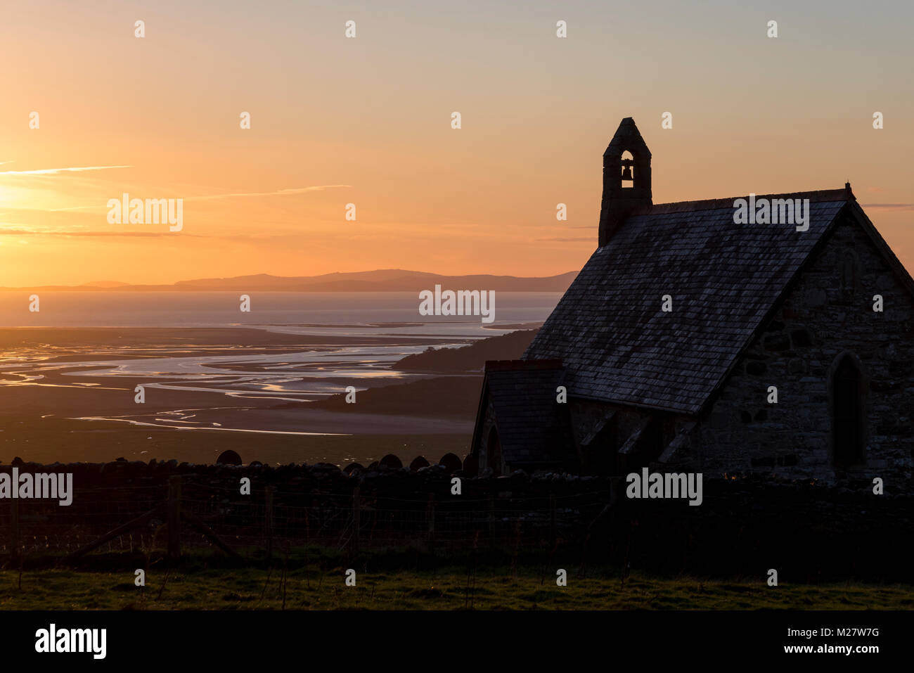 St Tecwyn's church at sunset. A small church high in the hills above the Dwyryd estuary near Harlech in Snowdonia, North Wales. Stock Photo