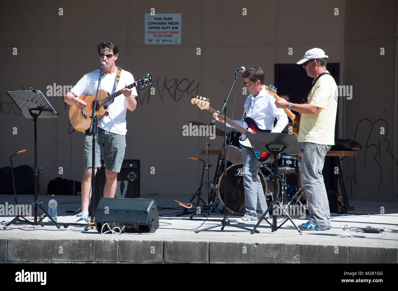 Guitarists On Stage Performing Stock Photo