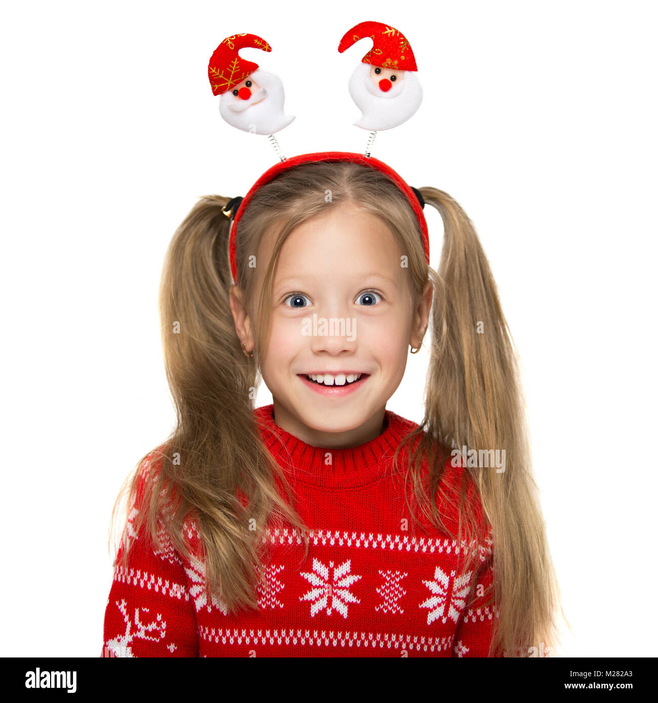 Portrait Of A Cheerful Child In A Christmas Costume Photo On A White portrait-of-a-cheerful-child-in-a-christmas-costume-photo-on-a-white