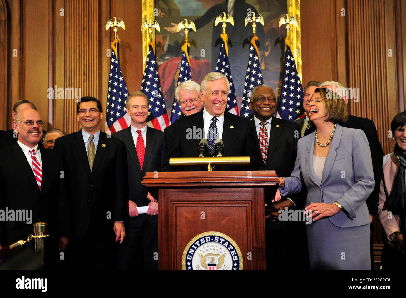 United States House Democratic Leaders celebrate the passage of the health care reform bill in the U.S. Capitol in Washington, D.C. early Monday morning, March 22, 2010.  From left to right: U.S. Representative Henry Waxman (Democrat of California); U.S. Representative Xavier Becerra (Democrat of California);  U.S. Representative Chris Van Hollen (Democrat of Maryland); U.S. Representative George Miller (Democrat of California); U.S. House Majority Leader Steny Hoyer (Democrat of Maryland); U.S  House Majority Whip Jim Clyburn (Democrat of South Carolina); U.S. House Speaker Nancy Pelosi (Demo Stock Photo