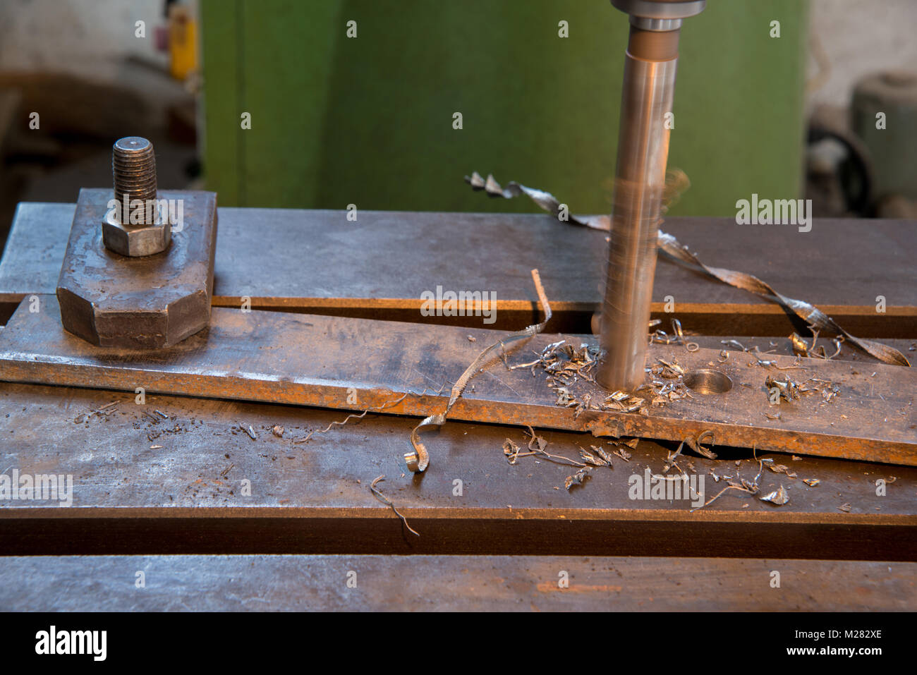 drilling of the metal plate, close up Stock Photo