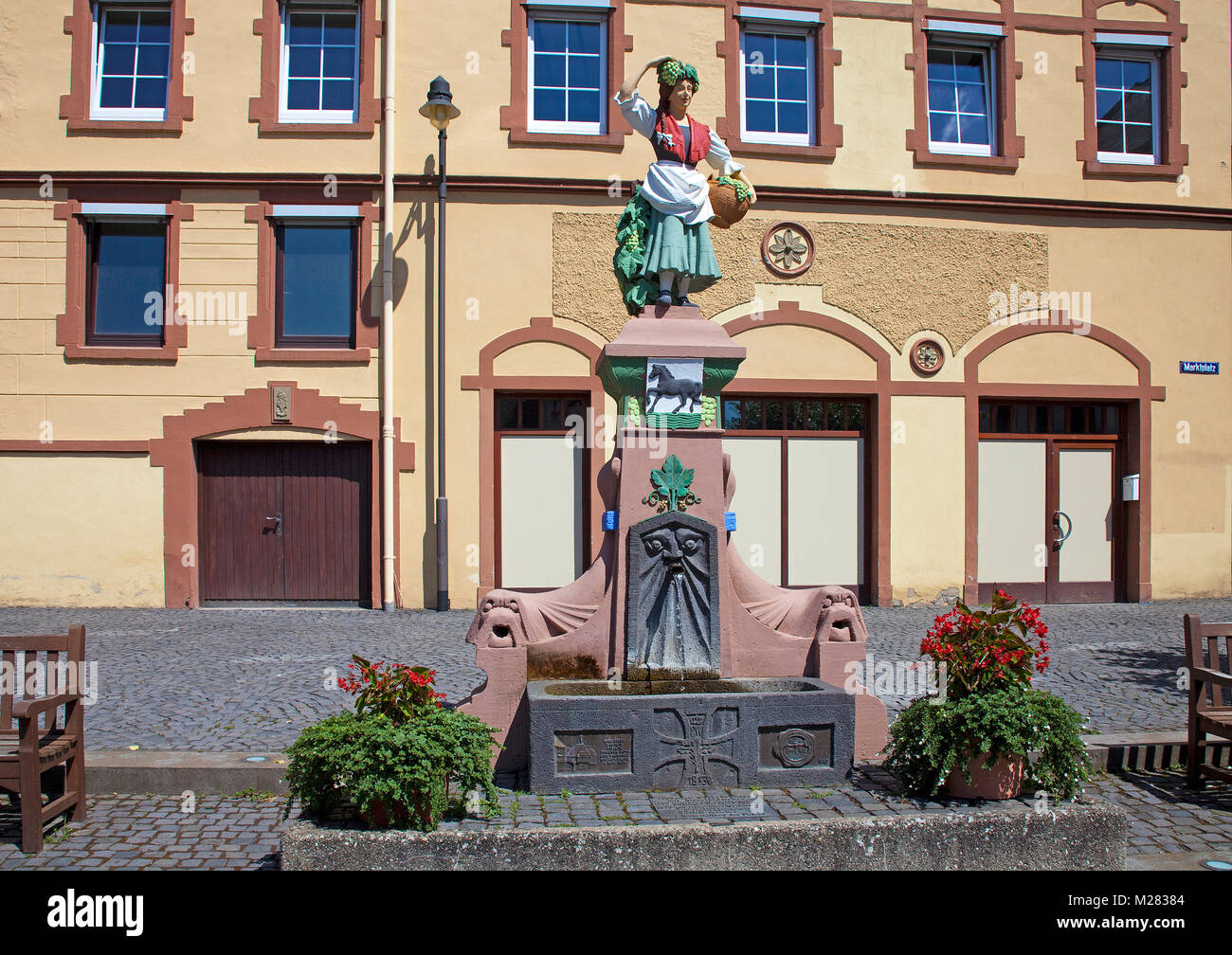 Village well, figure shows a woman with traditional Moselle costume, Traben, Traben-Trarbach, Moselle river, Rhineland-Palatinate, Germany, Europe Stock Photo
