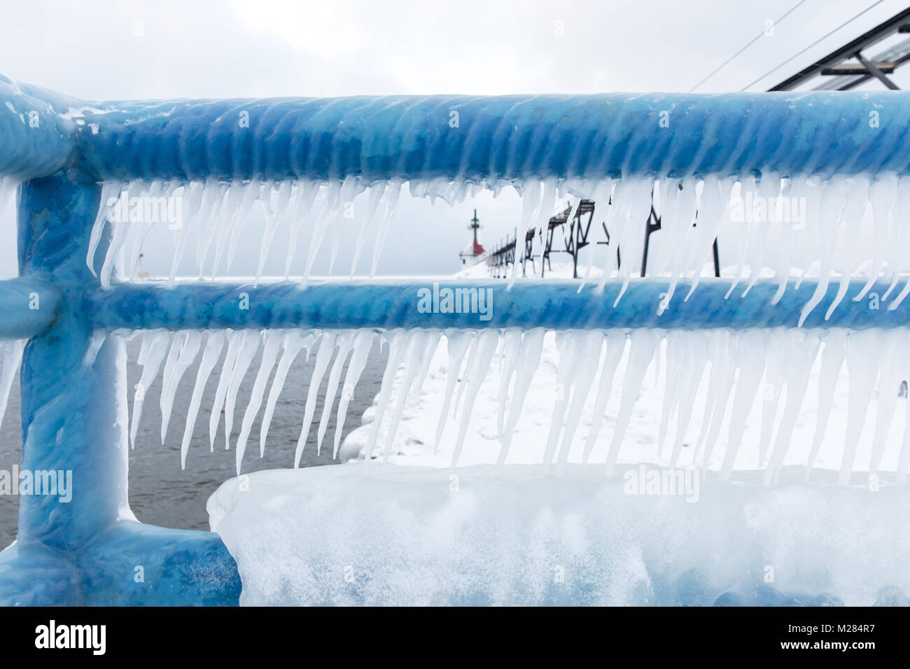 The ice covered lighthouse of St. Joseph, Michigan, on Lake Michigan in winter Stock Photo