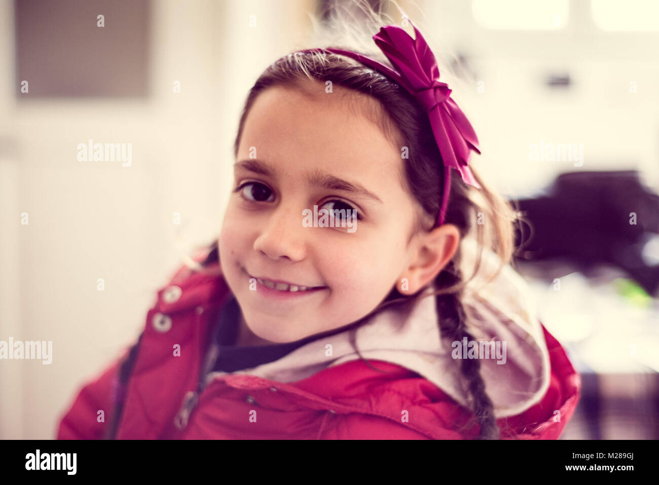 portrait of smiling little girl in her home Stock Photo - Alamy