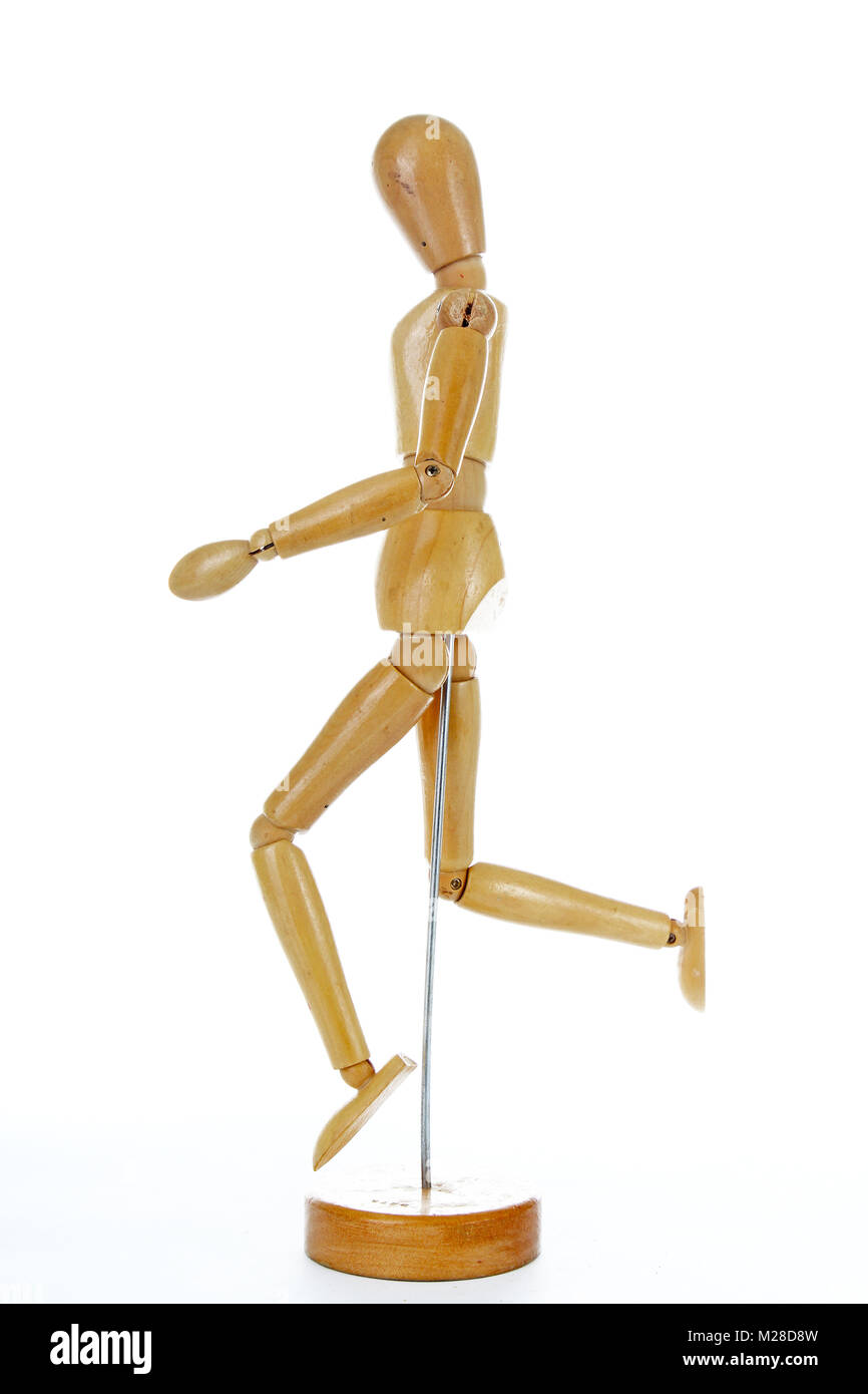 Wooden mannequin drawing model human shape. Doll body figurine statue pose posing to illustrate