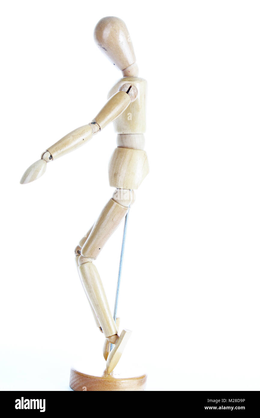 Wooden mannequin drawing model human shape. Doll body figurine statue pose posing to illustrate