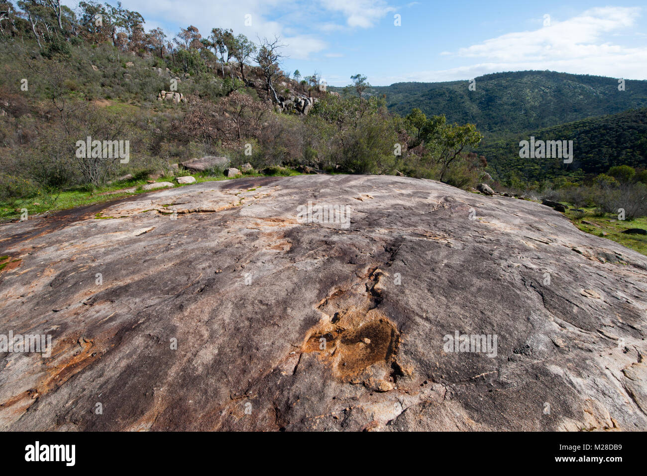 landscape shoing granite rock out crop to valley and hills beyond in avon valley national park wetsern australia australia Stock Photo