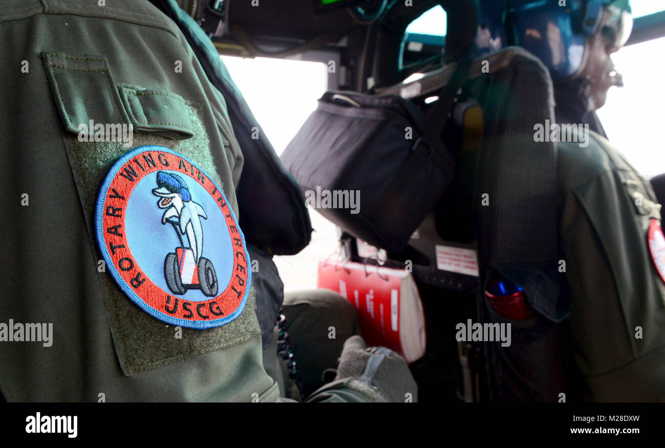 The Coast Guard Rotary Wing Air Intercept patch is shown on the sleeve of a flight mechanic just before takeoff in Washington, D.C., Jan. 30, 2018. Crews from Air Station Atlantic City support the National Capital Region Air Defense Facility (NCRADF) by supplying multiple aircraft to assist the North American Aerospace Defense Command (NORAD). U.S. Coast Guard Stock Photo