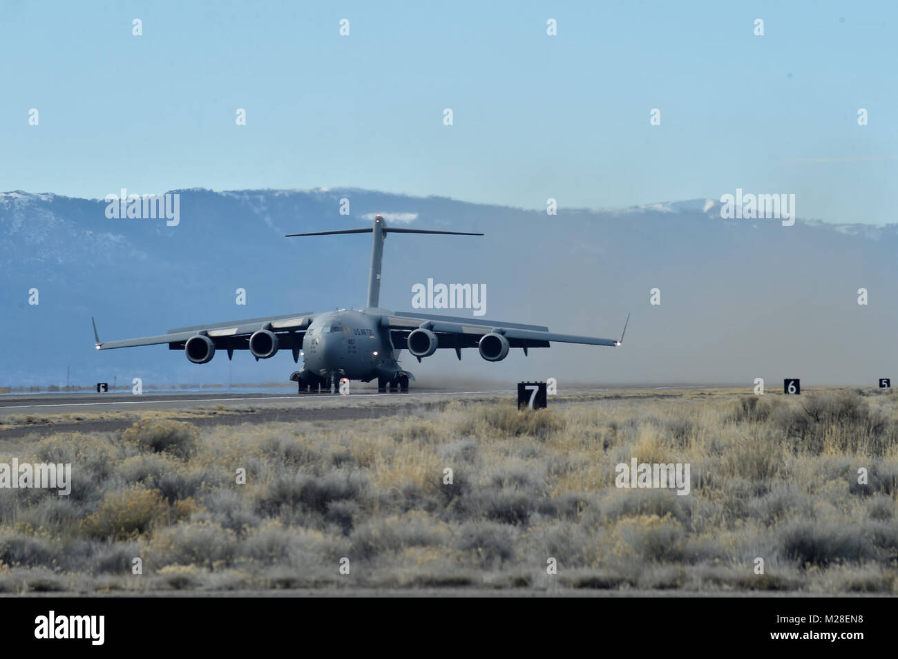 A C17 Globemaster aircraft from Travis Air Force Base, Calif., lands