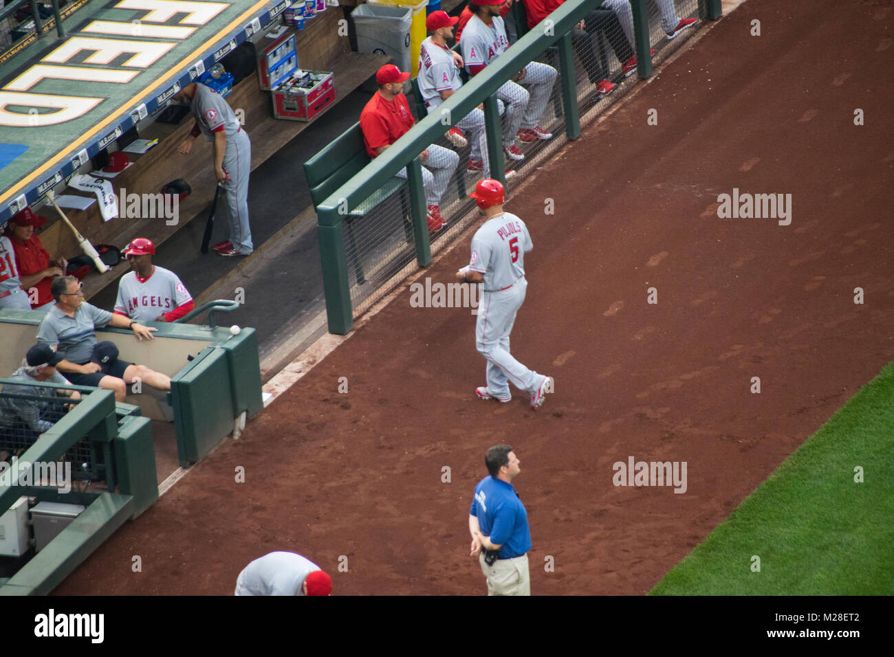Albert Pujols from the Los Angeles Angels returns to dugout after his turn at bat against the Seattle Mariners. Stock Photo