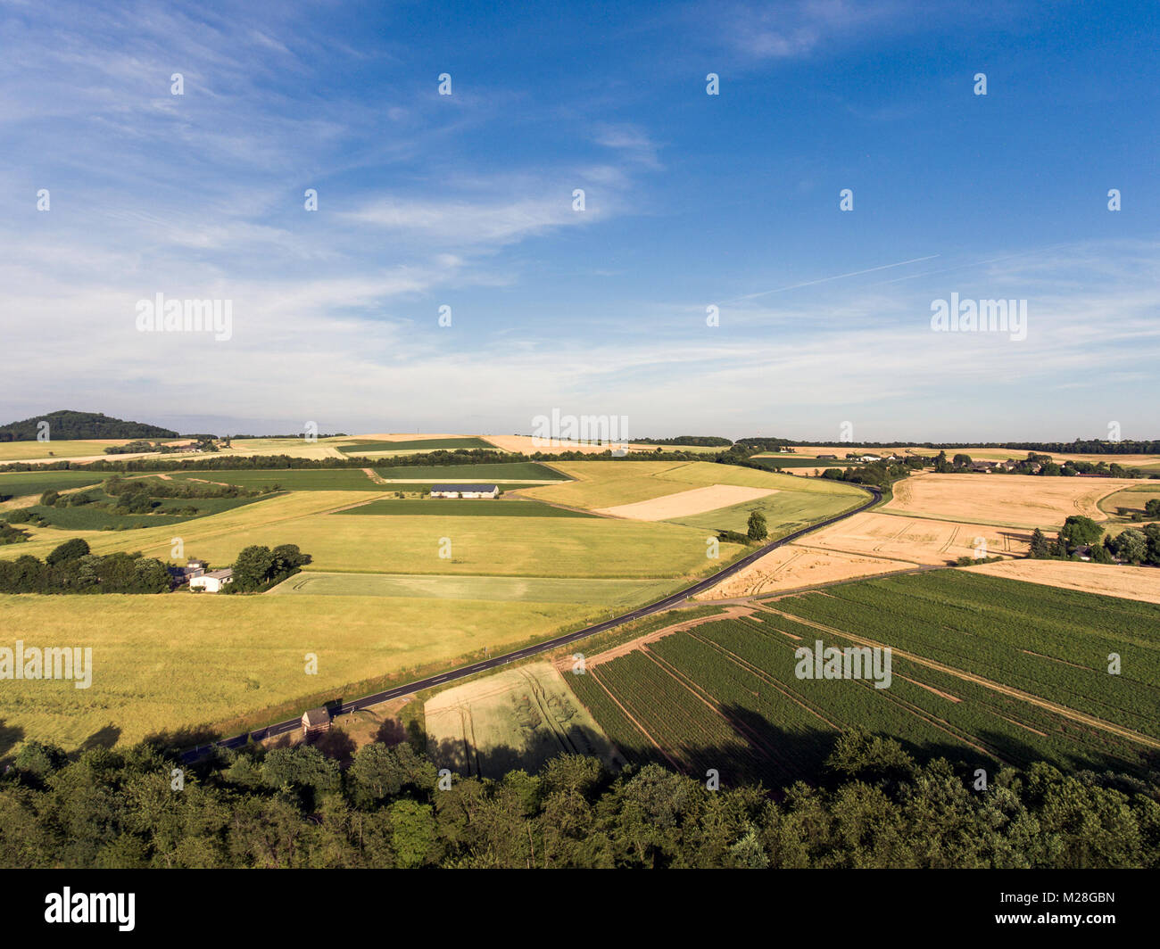 Aerial view of agricultural fields in spring with blue sky - germany ...
