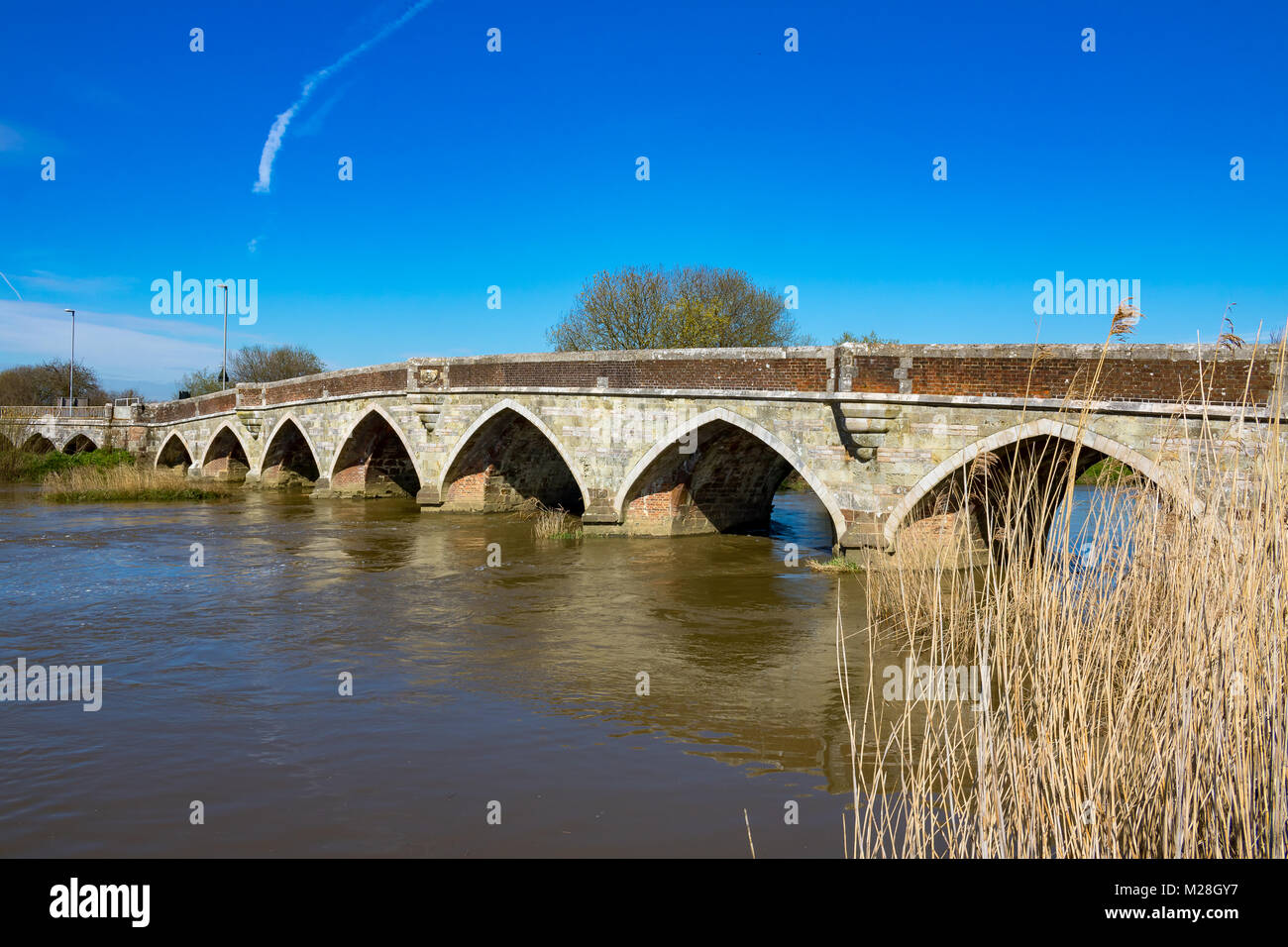 Wimborne Minster Dorset England April 13, 2016 old stone bridge over the river Stour at Wimborne Minster Stock Photo