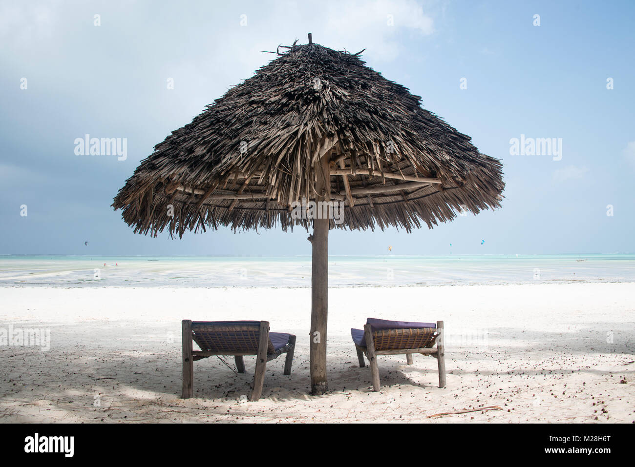 Thatched umbrella on the beach at Paje, Zanzibar, Tanzania Stock Photo