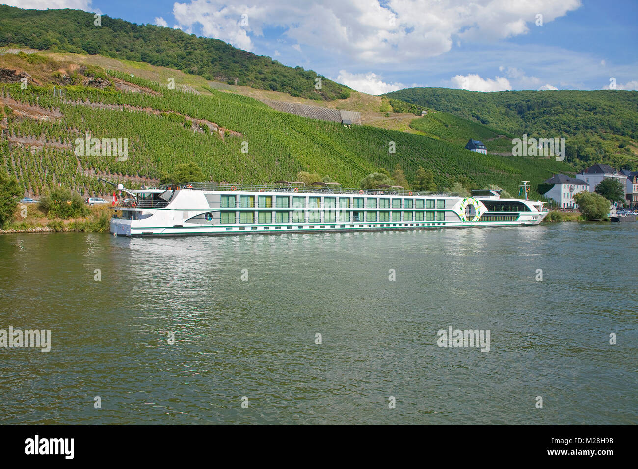 River cruise ship at Bernkastel-Kues, Moselle river, Rhineland-Palatinate, Germany, Europe Stock Photo