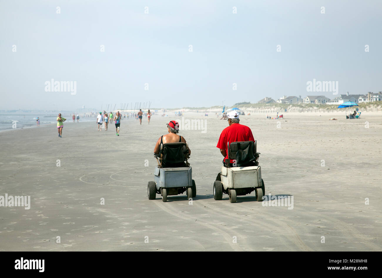 Stone Harbor Beach Couple in Mobility Scooters in New Jersey USA