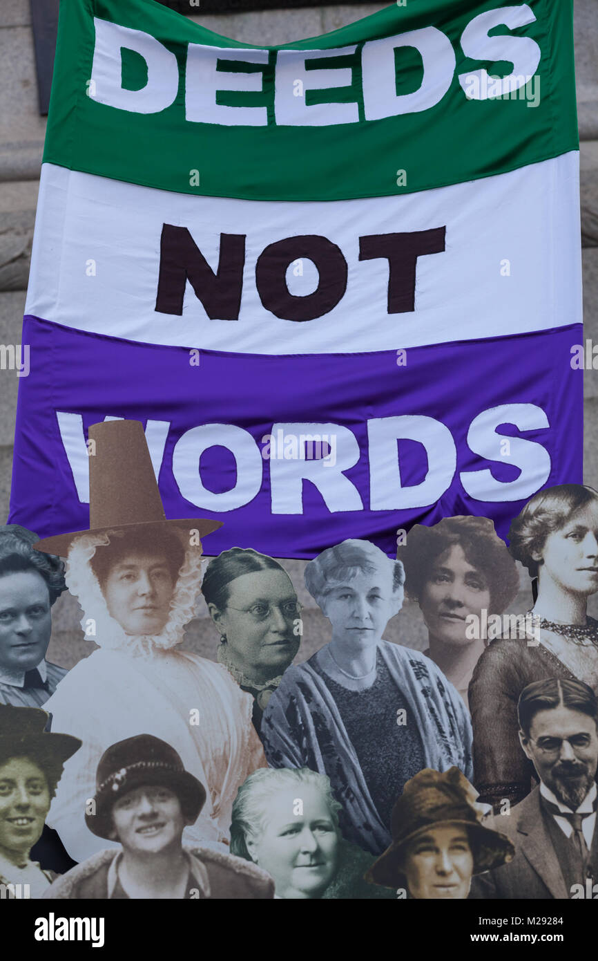 Trafalgar Square, London, 6th Feb 2018. Tourists and Londoners interact with the exhibition A collection of life-size images of of the suffragettes form a public exhibition on Trafalgar Square, part of Mayor of London Sadiq Khan’s campaign celebrating women’s contributions to the capital and the centenary of women’s suffrage. Credit: Imageplotter News and Sports/Alamy Live News Stock Photo