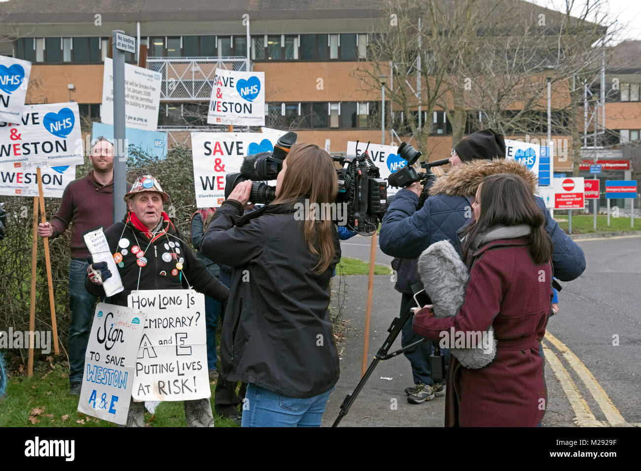 Weston-super-Mare, UK. 6th February, 2018. Demonstrators protest against the overnight closure of the accident and emergency department at Weston General Hospital. Despite assurances that the closure is only a temporary measure, it has been in effect since July 2017, and a recent proposal for a merger between Weston Area Health NHS Trust and University Hospitals Bristol NHS Foundation Trust has created further uncertainty about Weston General Hospital’s future. Keith Ramsey/Alamy Live News Stock Photo