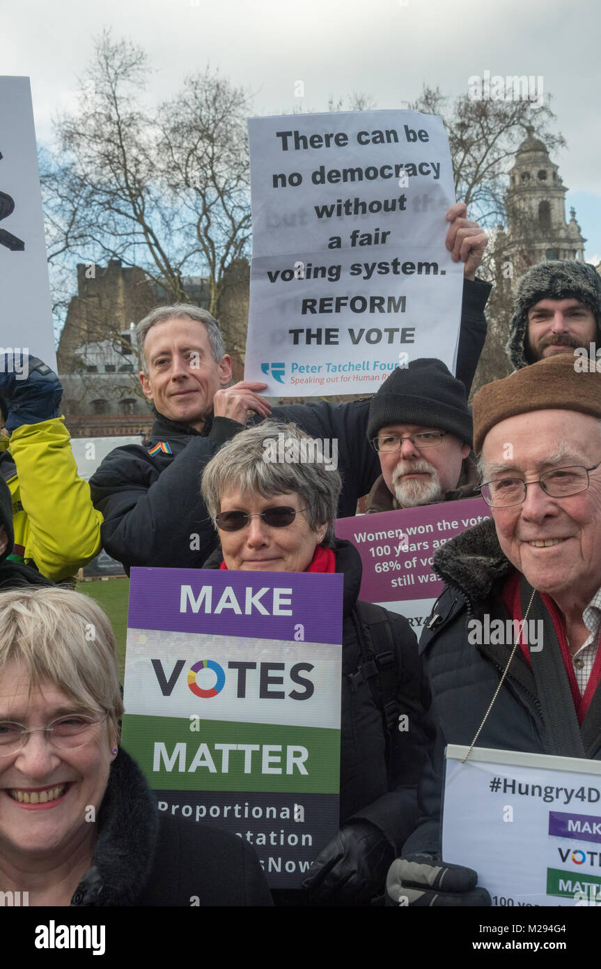 London, UK. 5 February 2018.  Peter Tatchell with other campaigners in Parliament Square as hundreds of fair vote campaigners take part in a 24 hour hunger strike organised by Make Votes Matter (MVM) in protest against our dysfunctional electoral system and to urge Proportional Representation.  The event took place on the centenary of the 1918 the Representation of the People Act when for the first time some women and all men over 21 in the UK gained the right to vote. MVM point out that although now everyone can vote, for over two thirds of us our vote has no effect on the result, 'either goi Stock Photo