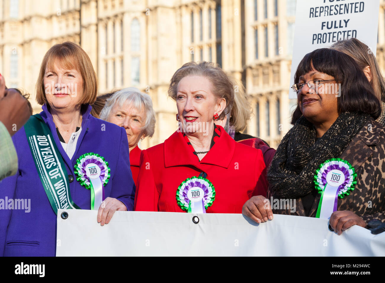 Westminster, London, UK. 6th Feb 2018. Harriet Harman (l), Dame Margaret Beckett (m), Diane Abbott (r). Labour's female MPs and peers, including, Dame Margaret Beckett, Diane Abbott, Dame Margaret Hodge, Dawn Butler, Angela Eagle and many others celebrate the centenary of women's suffrage and 100 years of women voting in front of the Houses of Parliament. Credit: Imageplotter News and Sports/Alamy Live News Stock Photo