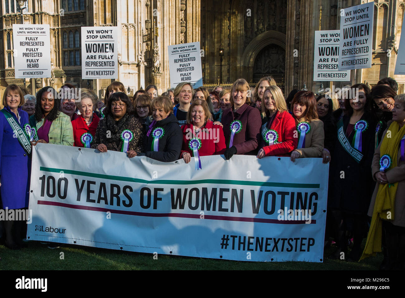 London, UK. 6th Feb, 2018. Female Labour MPs celebrate the centenary of women's suffrage outside the Palace of Westminster. The Representation of the People Act was passed on 6th February 1918 and gave women aged over 30 and 'of property' the right to vote. Credit: Mark Kerrison/Alamy Live News Stock Photo