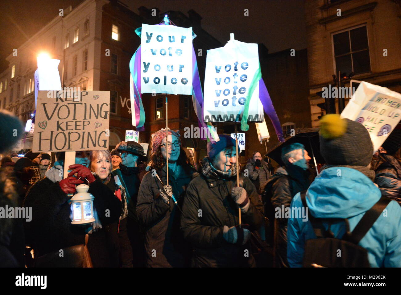 Bristol, UK. 6th Feb, 2018. 100 years ago today British women secured the right to vote. Lantern demo park Street Bristol. Credit: Robert Timoney/Alamy Live News Stock Photo