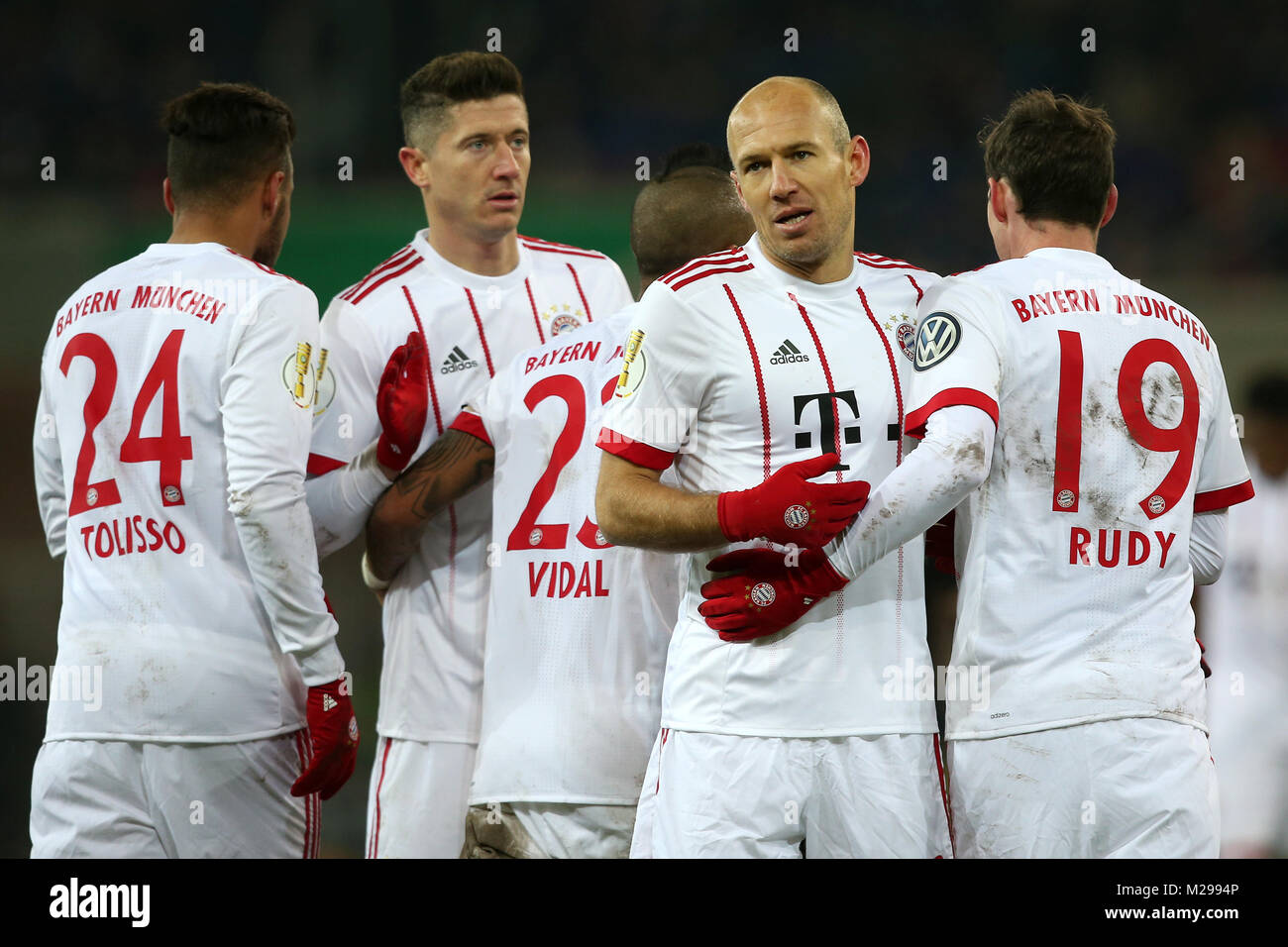 (180207) -- PADERBORN, Feb. 7, 2018(Xinhua) -- Arjen Robben (2nd R) of Bayern Munich celebrates with teammates after scoring during the quarterfinal match of German Cup between SC Paderborn and Bayern Munich at Benteler Arena in Paderborn, Germany, on Feb. 6, 2018. Bayern Munich won 6-0. (Xinhua/Ulrich Hufnagel) Stock Photo