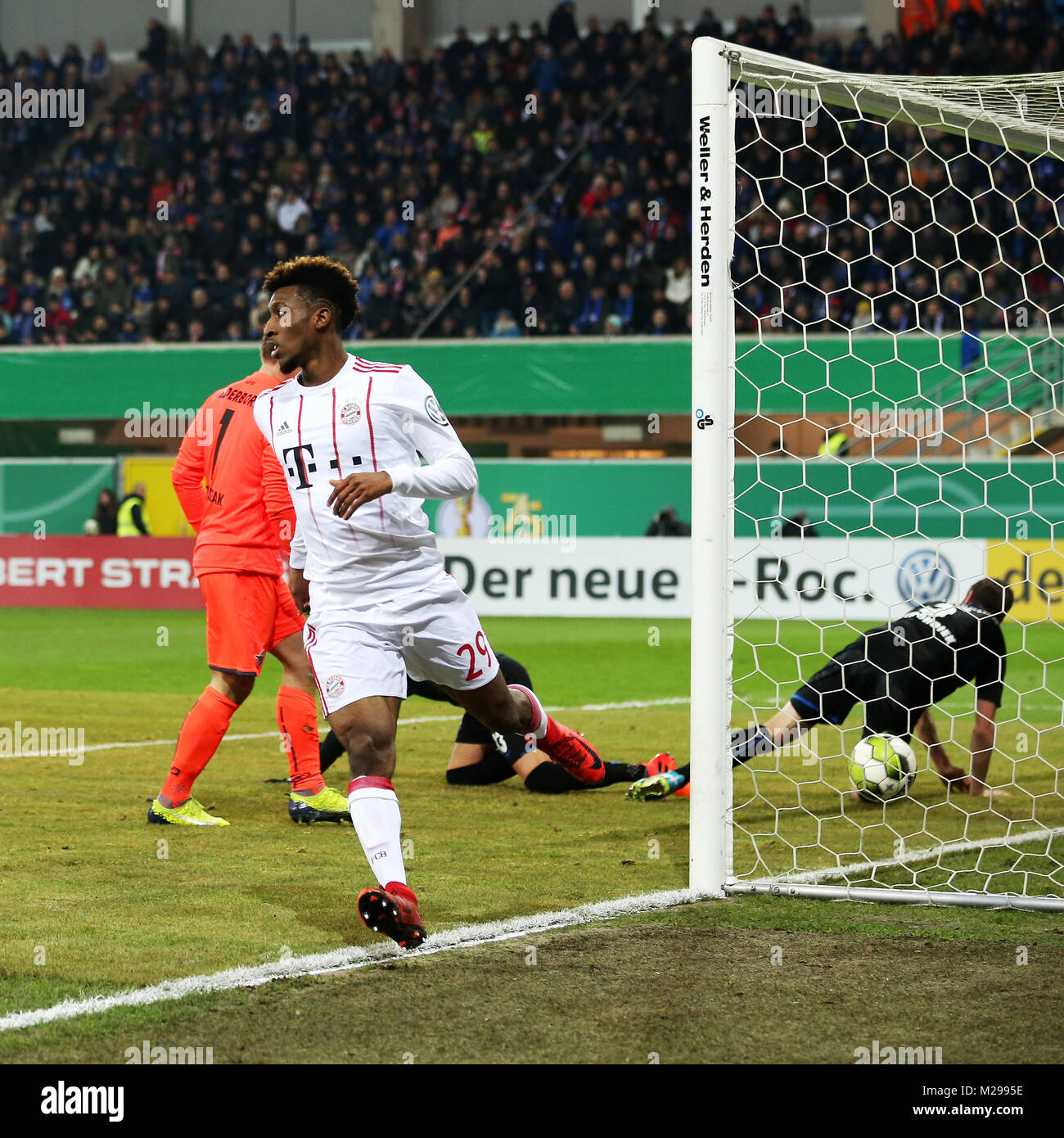 (180207) -- PADERBORN, Feb. 7, 2018(Xinhua) -- Kingsley Coman (Front) of Bayern Munich scores during the quarterfinal match of German Cup between SC Paderborn and Bayern Munich at Benteler Arena in Paderborn, Germany, on Feb. 6, 2018. Bayern Munich won 6-0. (Xinhua/Ulrich Hufnagel) Stock Photo