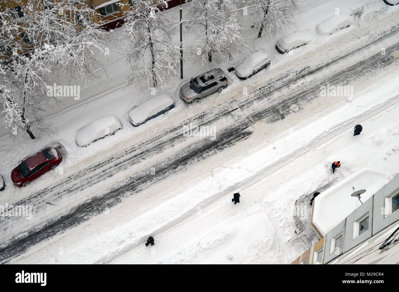 janitors cleans snow after snowfall in Moscow russia 04 February 2018. Top view Stock Photo