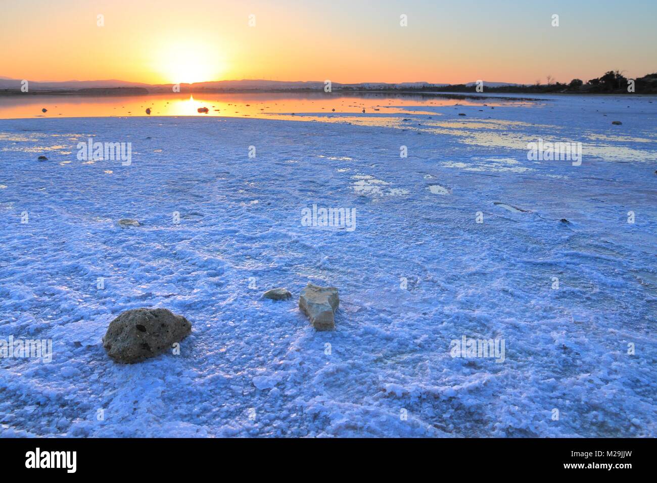 Cyprus - Larnaca salt lake. Ground covered in white salt. Stock Photo
