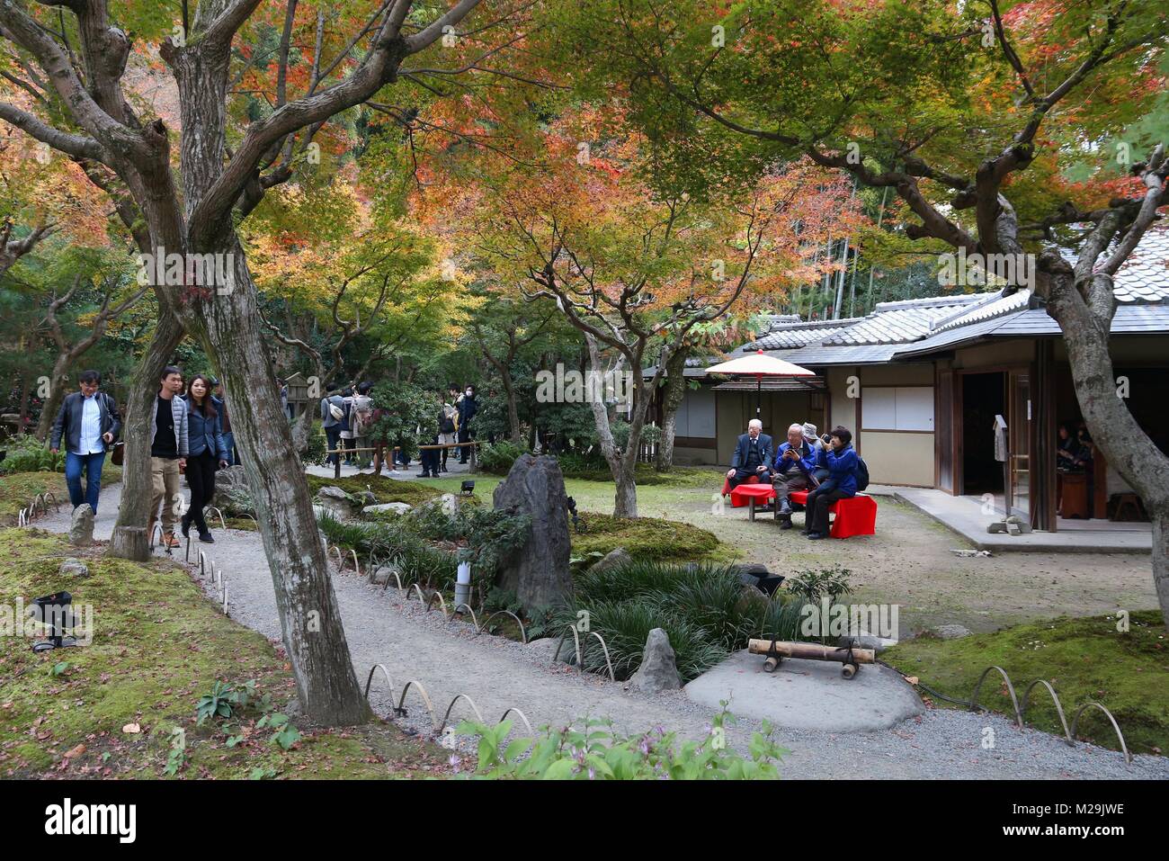 KYOTO, JAPAN - NOVEMBER 26, 2016: People visit Kodaiji temple gardens in Kyoto, Japan. 19.7 million foreign tourists visited Japan in 2015. Stock Photo