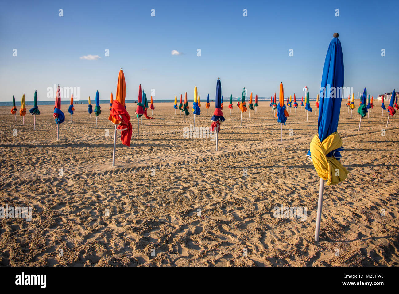 Colorful parasols on Deauville beach, France Stock Photo